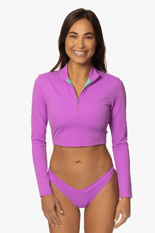 Ruched bikini with fabric gathers for a slimming effectTofino Long Sleeved Crop 1/4 Zip-up Rashie - Dreamer